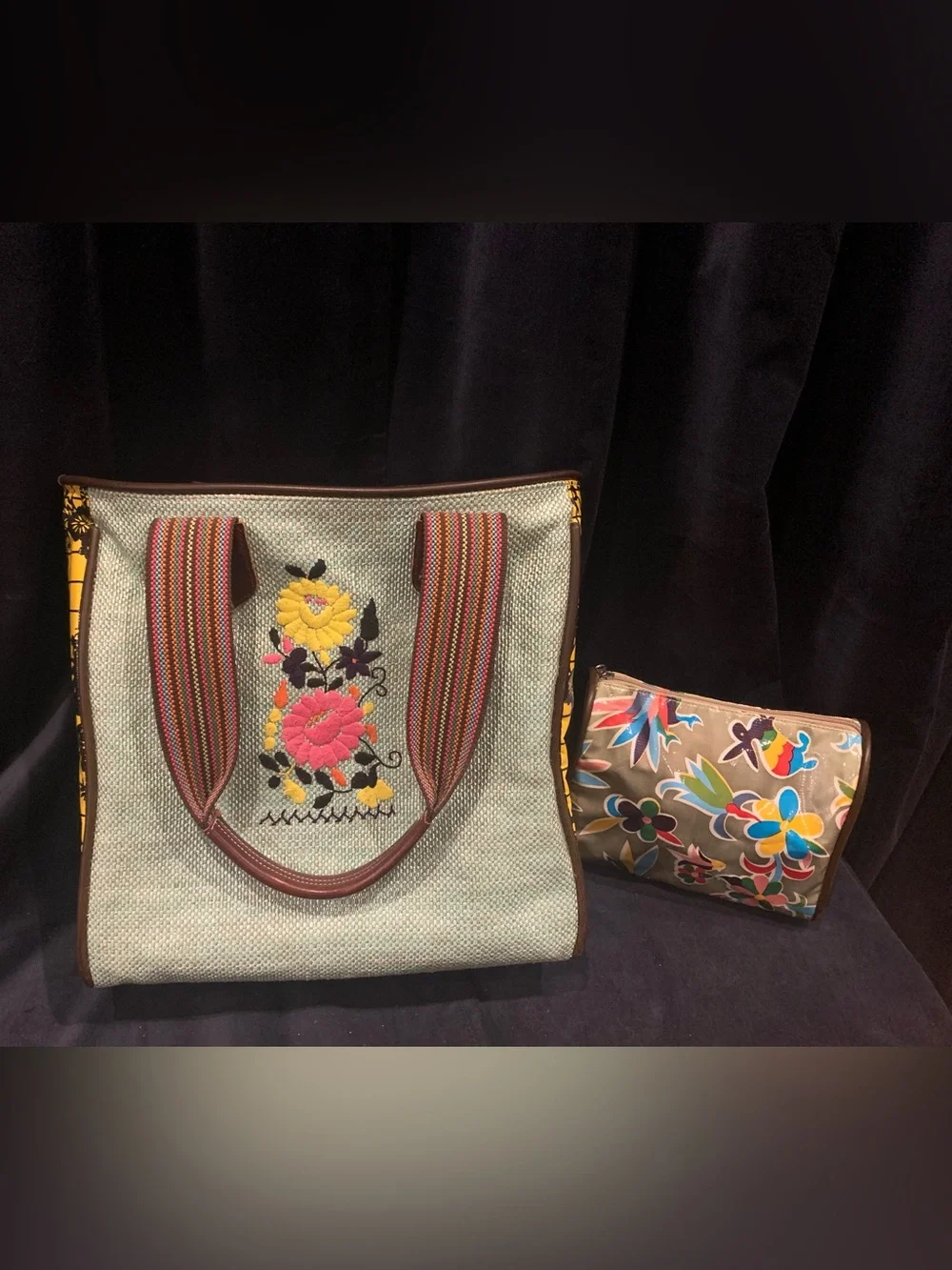 Consuela bag with small cosmetics bag.